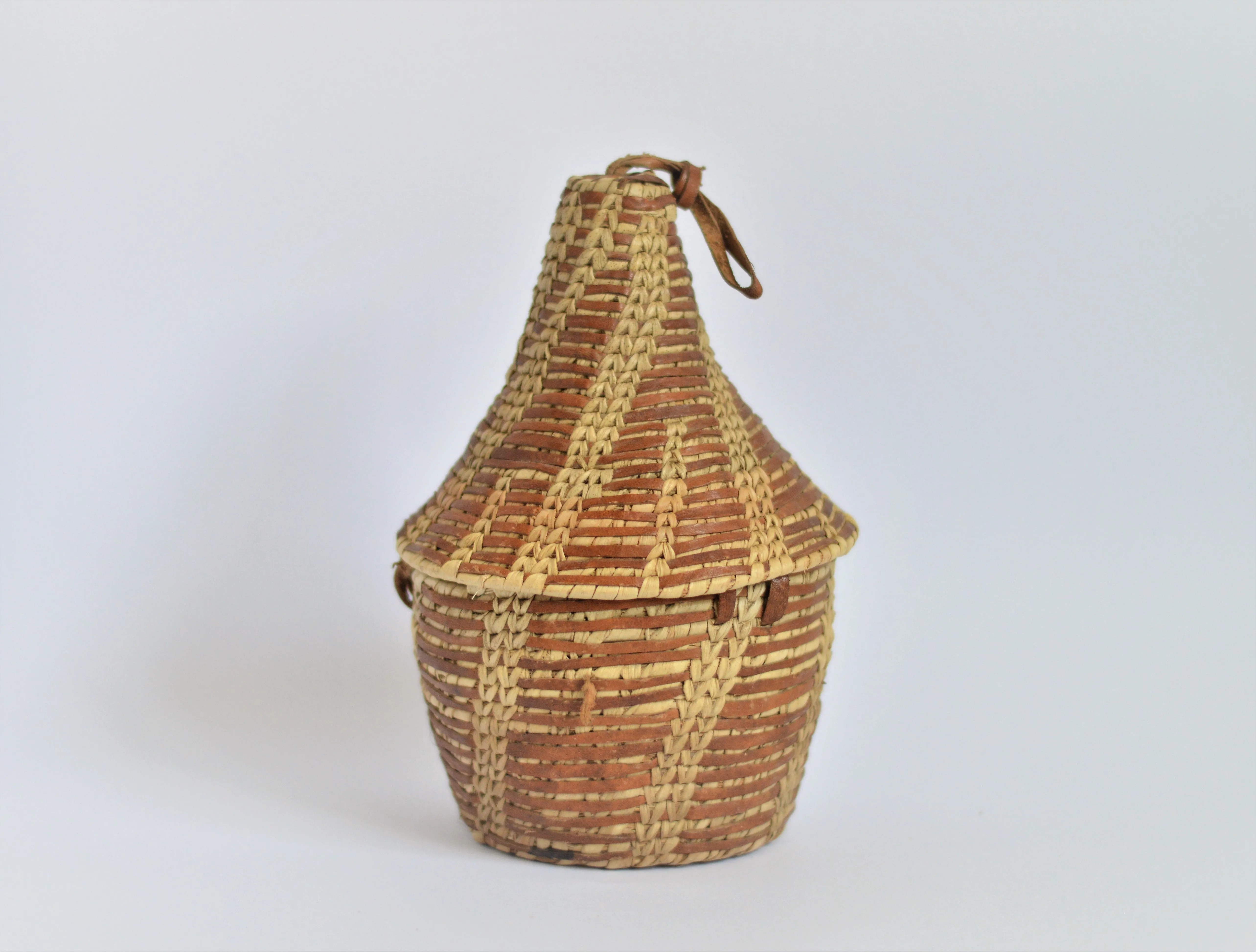 Egyptian woven leather basket , Ethiopian-style "Gabana" basket with lid