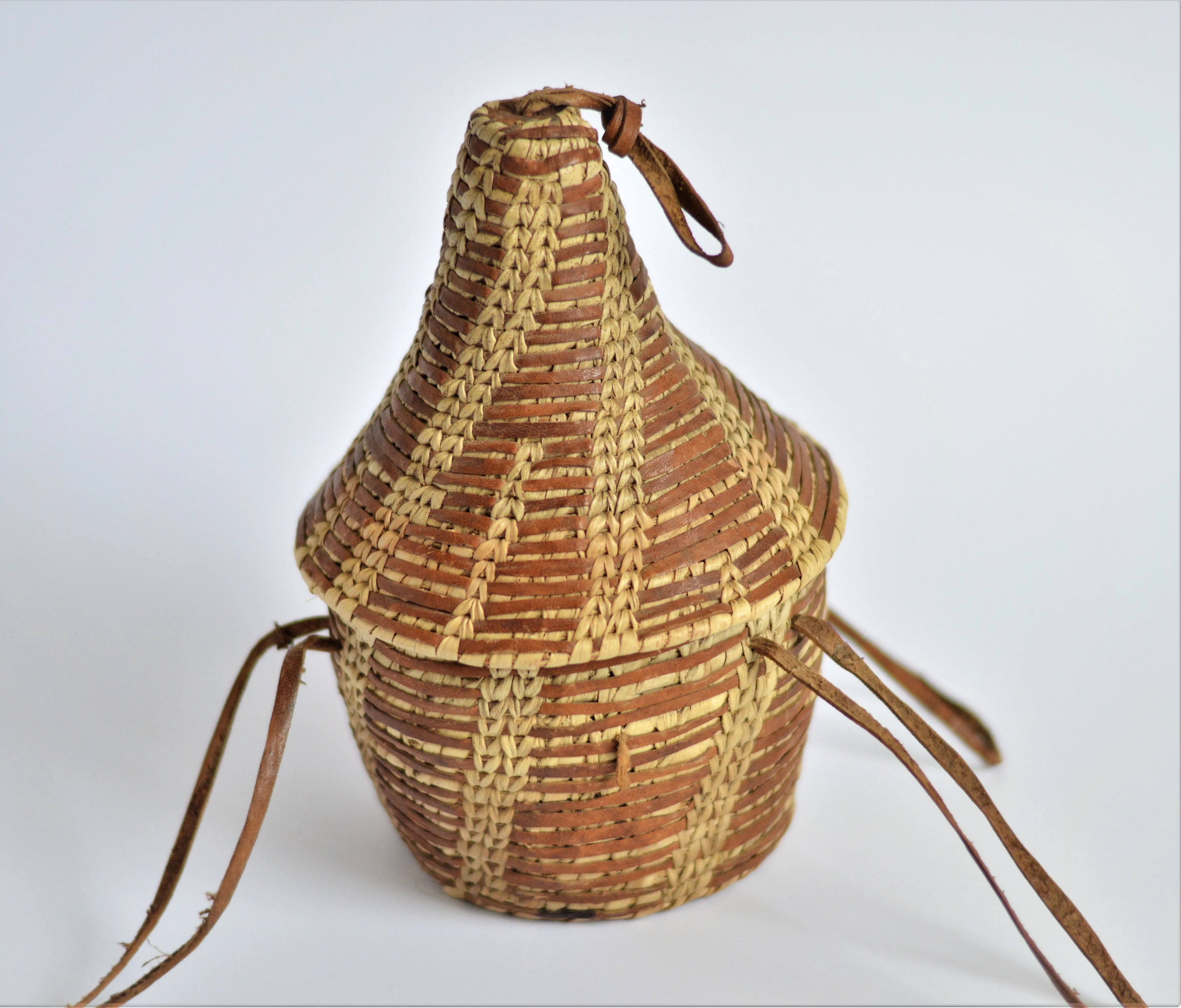 Egyptian woven leather basket , Ethiopian-style "Gabana" basket with lid